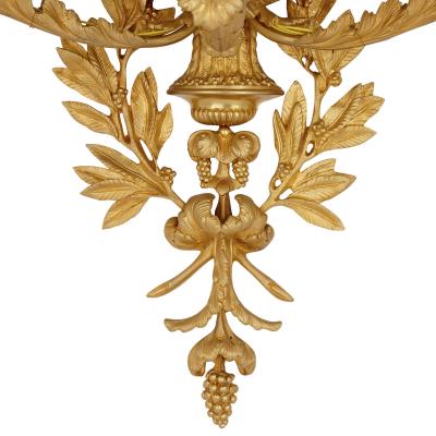 Pair of Neoclassical style gilt bronze sconces