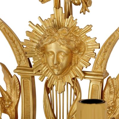 Pair of Neoclassical style gilt bronze sconces