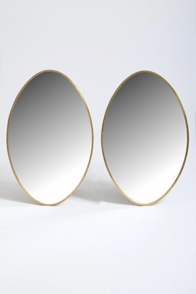 Pair of Oval Brass Mirrors