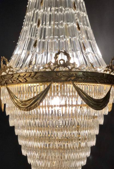 Pair of Palatial Bronze and Crystal Swag Design Louis XVI Style Chandeliers