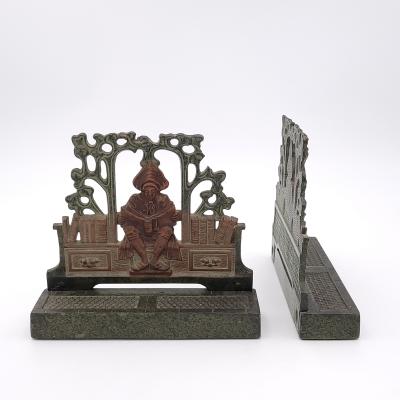 Pair of Patinated Bronze Bookends on Granite Bases Inspired by Maxfield Parrish