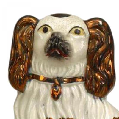 Pair of Porcelain and Copper Staffordshire Dogs