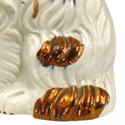 Pair of Porcelain and Copper Staffordshire Dogs