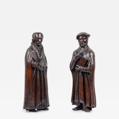 Pair of Renaissance Walnut Scholarly Figures