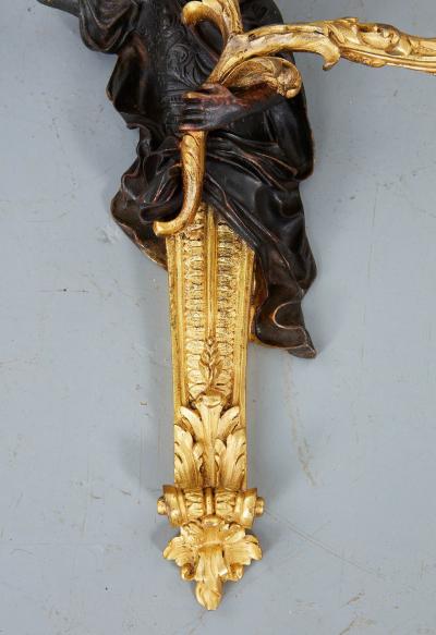 Pair of Rococo Bronze and Gilt Sconces