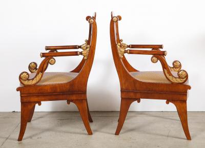Pair of Russian Neoclassical Parcel Gilt Mahogany Armchairs
