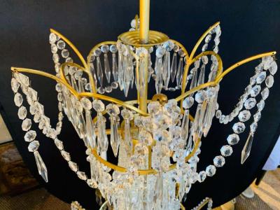 Pair of Russian Neoclassical Style Bronze and Crystal 7 Light Chandeliers