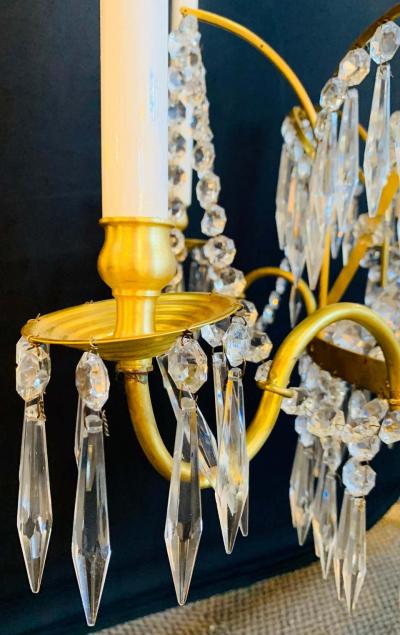 Pair of Russian Neoclassical Style Bronze and Crystal 7 Light Chandeliers