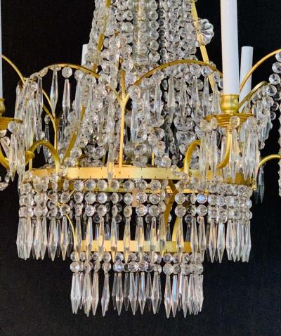 Pair of Russian Neoclassical Style Bronze and Crystal 7 Light Chandeliers