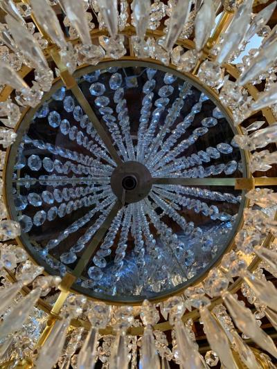 Pair of Russian Neoclassical Style Bronze and Crystal 7 Light Chandeliers