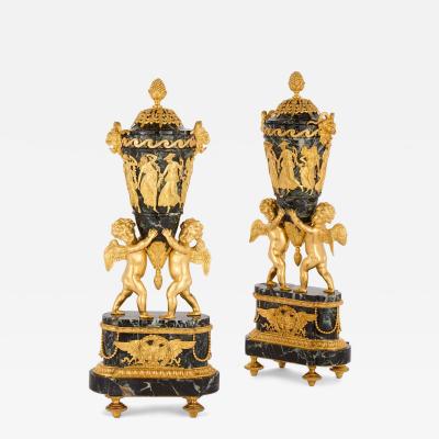 Pair of Russian marble and gilt bronze urns with covers