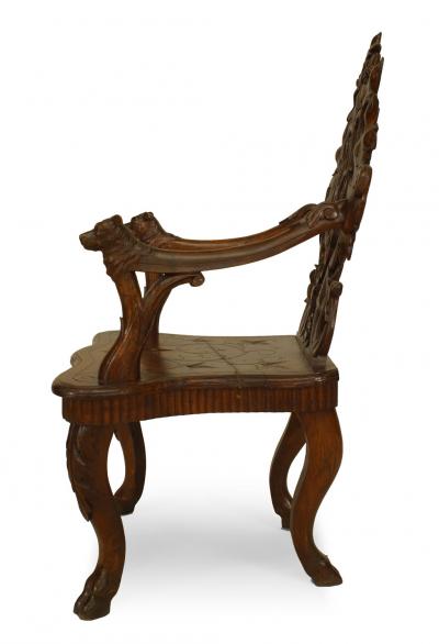 Pair of Rustic Black Forest Carved Walnut Armchairs