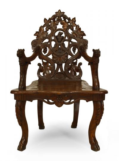 Pair of Rustic Black Forest Carved Walnut Armchairs