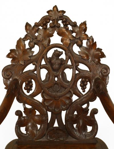 Pair of Rustic Black Forest Carved Walnut Armchairs