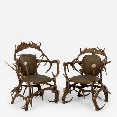 Pair of Rustic Continental Style Dark Olive Green Leather and Faux Antler Armcha