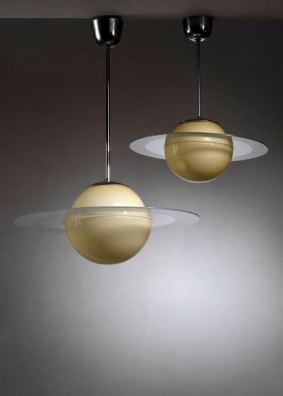 Pair of Saturn pendant lamps