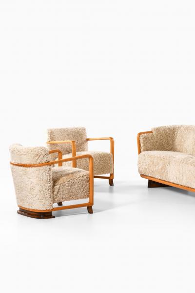 Pair of Scandinavian Art Deco Easy Chairs in Birch and Sheepskin 1930s
