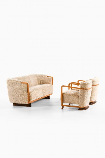 Pair of Scandinavian Art Deco Easy Chairs in Birch and Sheepskin 1930s