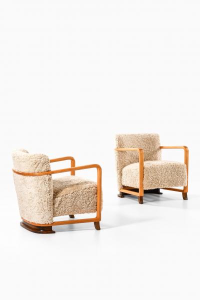 Pair of Scandinavian Art Deco Easy Chairs in Birch and Sheepskin 1930s
