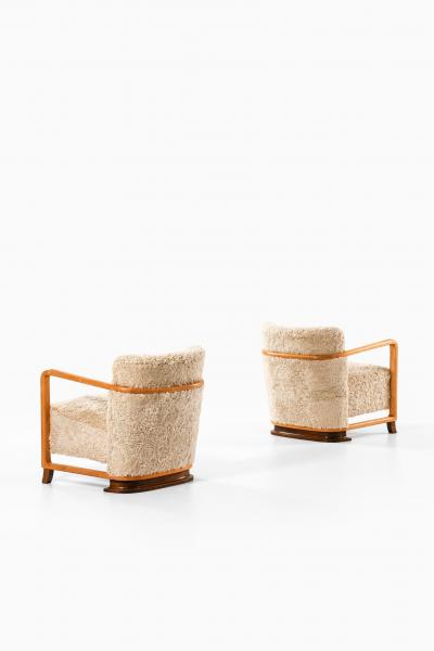 Pair of Scandinavian Art Deco Easy Chairs in Birch and Sheepskin 1930s