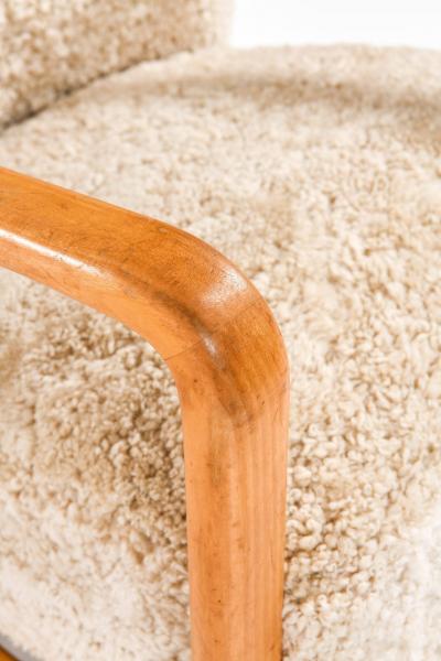 Pair of Scandinavian Art Deco Easy Chairs in Birch and Sheepskin 1930s