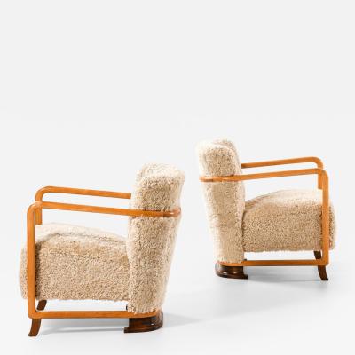 Pair of Scandinavian Art Deco Easy Chairs in Birch and Sheepskin 1930s