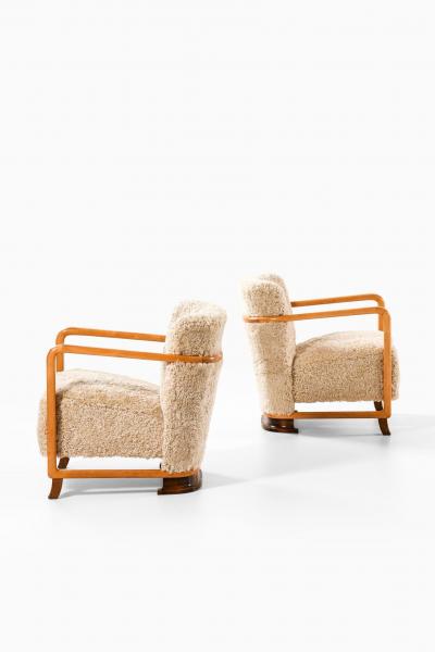 Pair of Scandinavian Art Deco Easy Chairs in Birch and Sheepskin 1930s