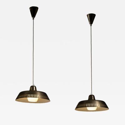 Pair of Scandinavian Modern brass pendants
