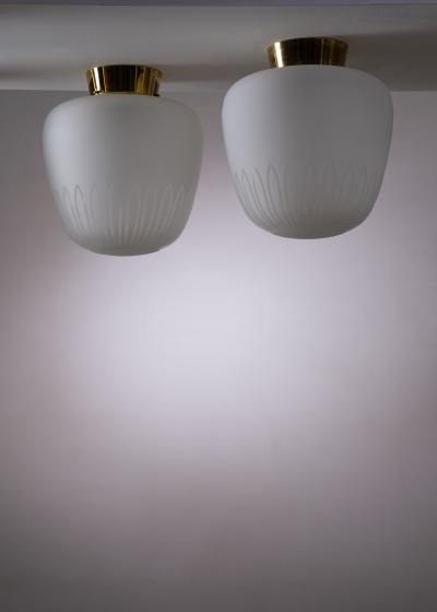 Pair of Scandinavian Modern frosted glass ceiling lamps