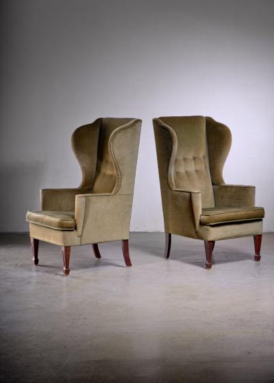 Pair of Scandinavian Modern green velour wingback lounge chairs