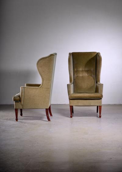 Pair of Scandinavian Modern green velour wingback lounge chairs