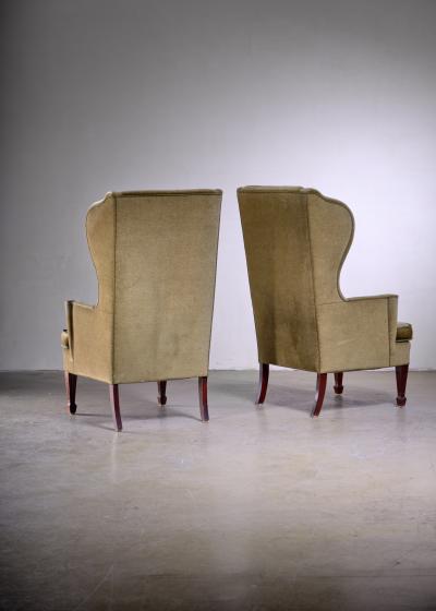 Pair of Scandinavian Modern green velour wingback lounge chairs