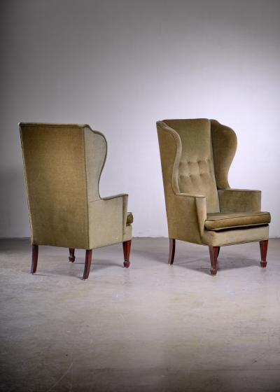 Pair of Scandinavian Modern green velour wingback lounge chairs