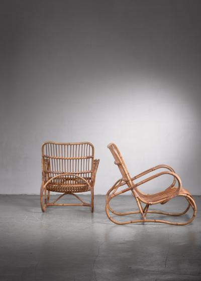 Pair of Scandinavian Modern rattan lounge chairs