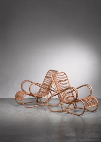 Pair of Scandinavian Modern rattan lounge chairs