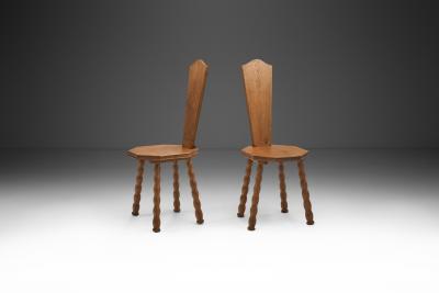 Pair of Sculptural Patinated Oak Spinning Chairs Europe ca Early 20th Century
