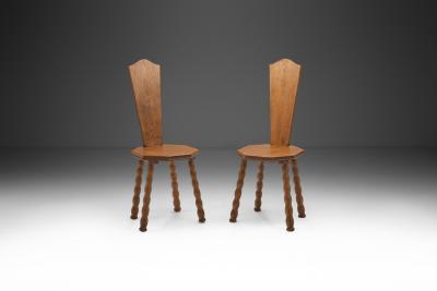 Pair of Sculptural Patinated Oak Spinning Chairs Europe ca Early 20th Century