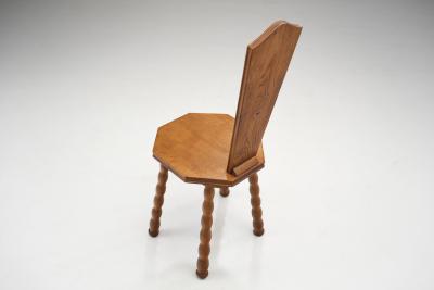 Pair of Sculptural Patinated Oak Spinning Chairs Europe ca Early 20th Century