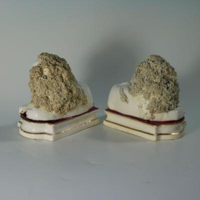 Pair of Shelton Staffordshire Lion and Lamb figures