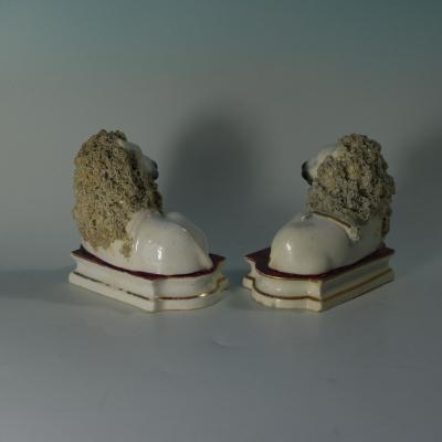 Pair of Shelton Staffordshire Lion and Lamb figures