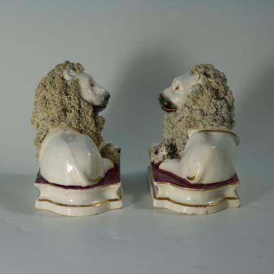 Pair of Shelton Staffordshire Lion and Lamb figures