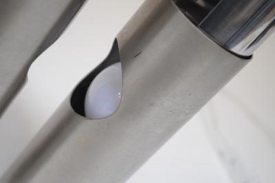 Pair of Small Italian Cylindrical Aluminum Bedside Lamps by Gaetano Missaglia