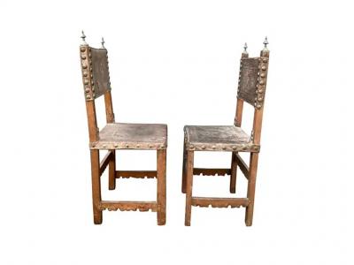 Pair of Spanish Baroque Embossed Leather Side Chairs