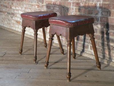 Pair of Spanish square upholstered Baroque oak stools