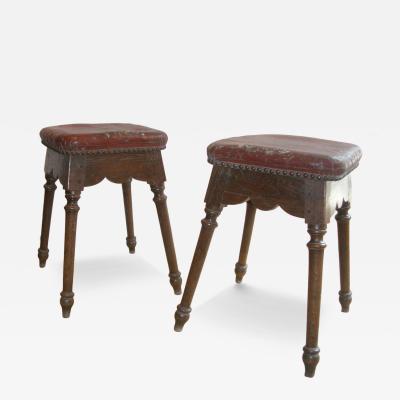 Pair of Spanish square upholstered Baroque oak stools