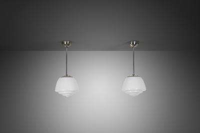 Pair of Stepped Opal Glass Pendant Lamps with Metal Frame Europe 1940s