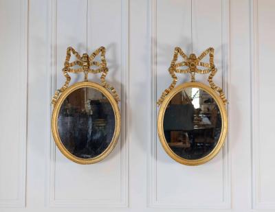 Pair of Swedish 20th Century Ribbon Crested Mirrors