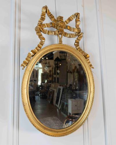 Pair of Swedish 20th Century Ribbon Crested Mirrors