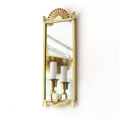 Pair of Swedish Grace era polished brass mirrored sconces 