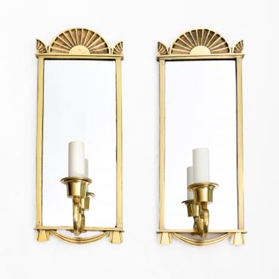 Pair of Swedish Grace era polished brass mirrored sconces 